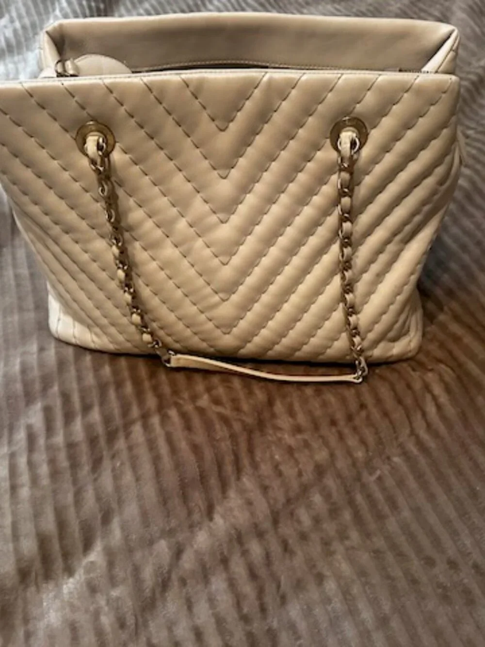 Chanel Surpique Chevron CC Charm Tote (often referred as Chevron V-Stitch Tote